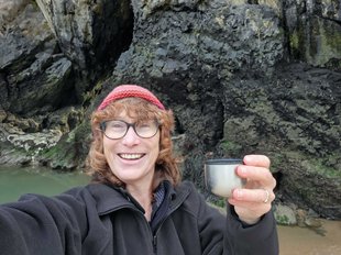 A women and her tea in the countryside