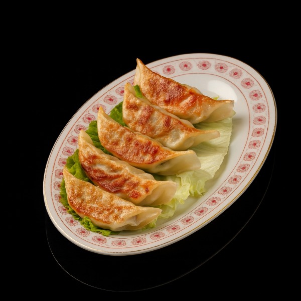 25. Raviolis au poulet grillé (5 pièces)