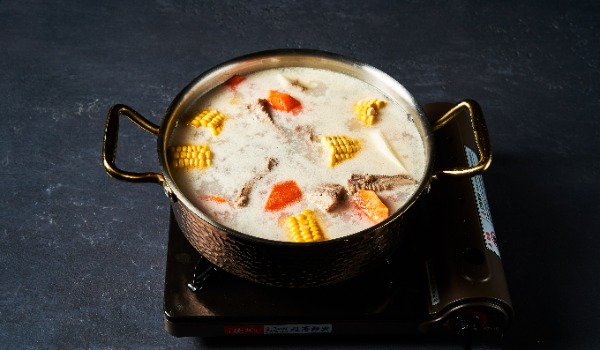 23. Pork rib soup with carrots, corn and yams