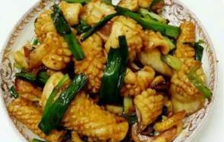 1042. Calamari con zenzero e cipollotto