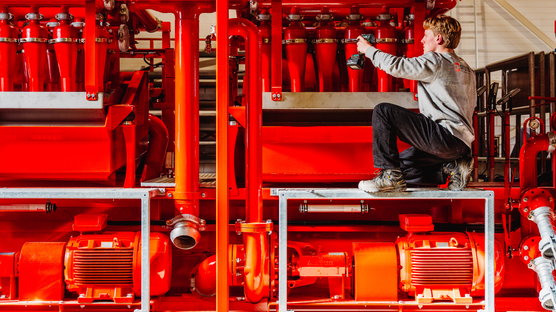 Vandenberg-SiteTec-werken-aan-machine