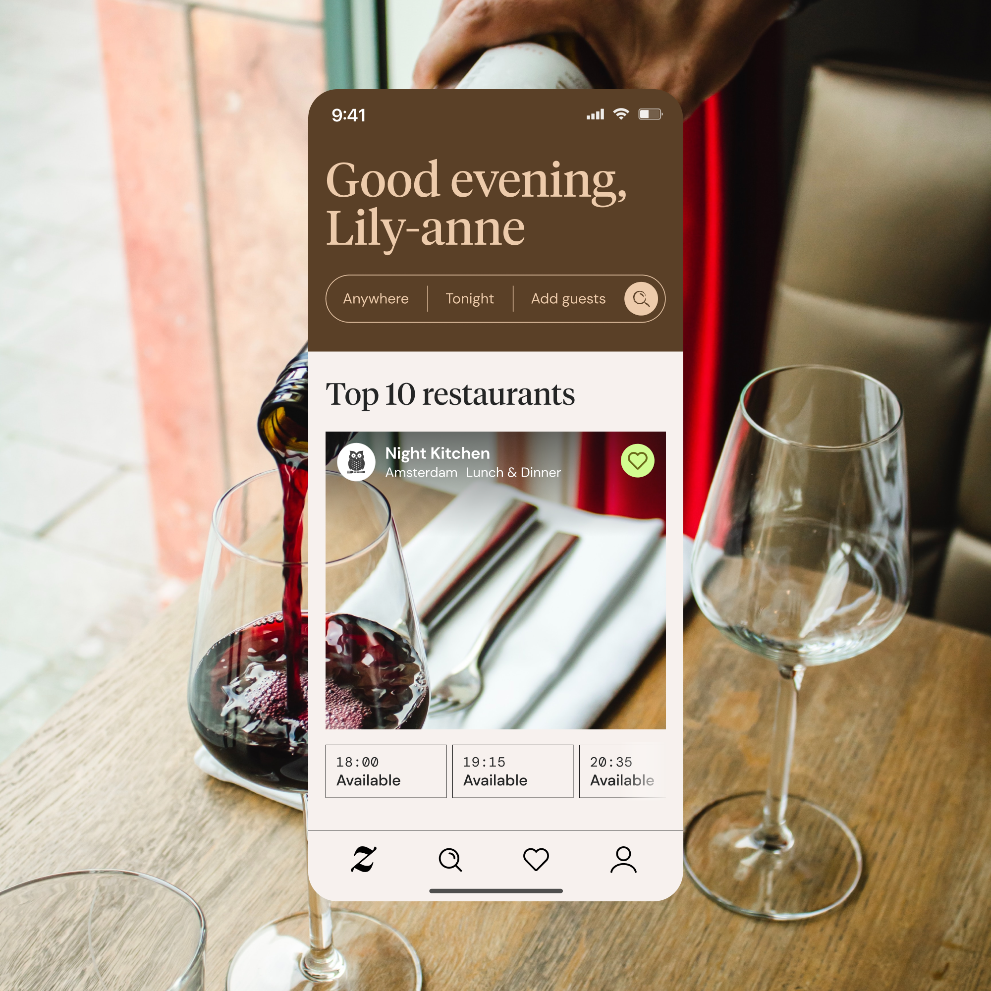 Zenchef restaurant-booking app mockup over a photo of wine being poured, showing a 'Good evening, Lily-anne' greeting, a search bar, and a 'Top 10 restaurants' listing with available booking times.